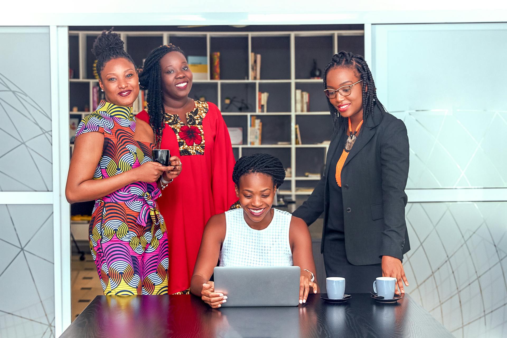 Two African women in business meeting sharing a moment together